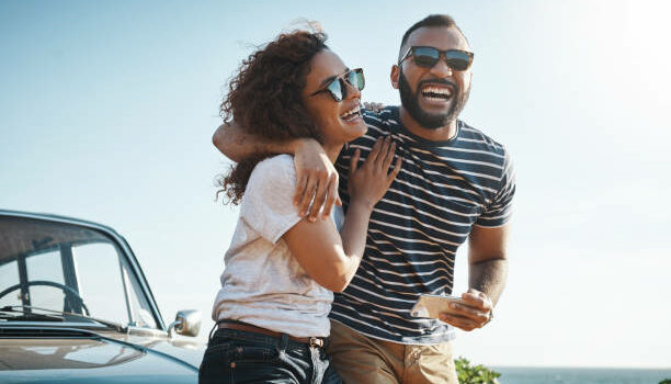 Shot of a young couple enjoying a summer’s road trip together